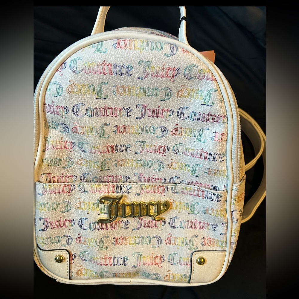 White multi colour juicy couture bag.